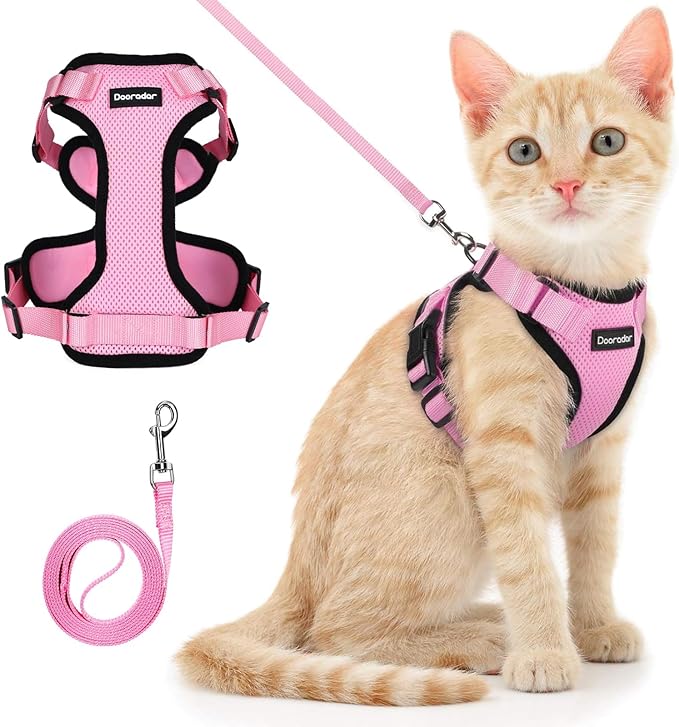 Dooradar Cat Harness and Leash Set, Escape Proof Safe Adjustable Kitten Vest Harnesses for Walking, Easy Control Soft Breathable Mesh Jacket with Reflective Strips for Cats, Pink, XS