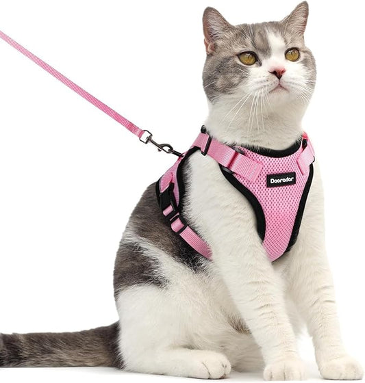 Dooradar Cat Harness and Leash Set, Escape Proof Safe Adjustable Kitten Vest Harnesses for Walking, Easy Control Soft Breathable Mesh Jacket with Reflective Strips for Cats, Pink, M