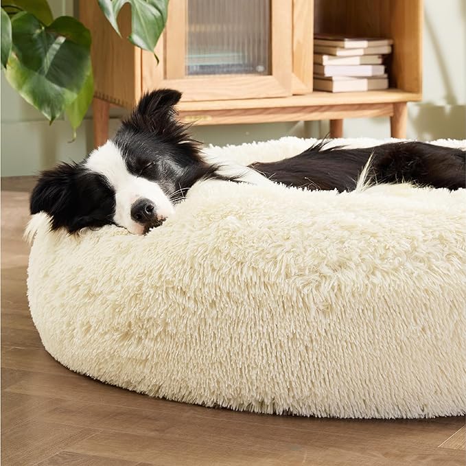 Bedsure Calming Dog Bed for Large Dogs - Donut Washable Large Pet Bed, Anti-Slip Round Fluffy Plush Faux Fur Dog Bed, Fits up to 80 lbs Pets, Ivory Beige, 36 inches